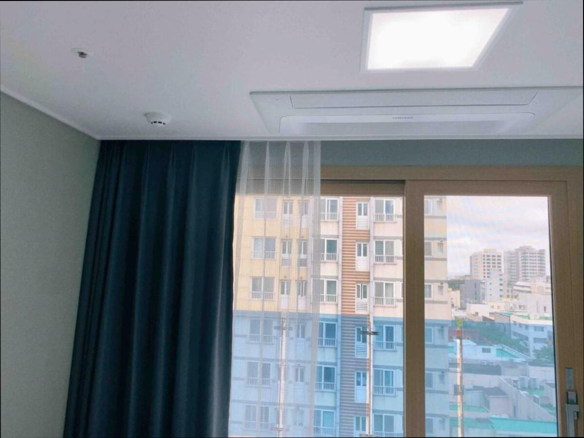 (이미지설명: 제주 시내의 아파트먼트 (26m², 침실 1개, 프라이빗 욕실 1개) - 객실 상세 리뷰 안내사진)